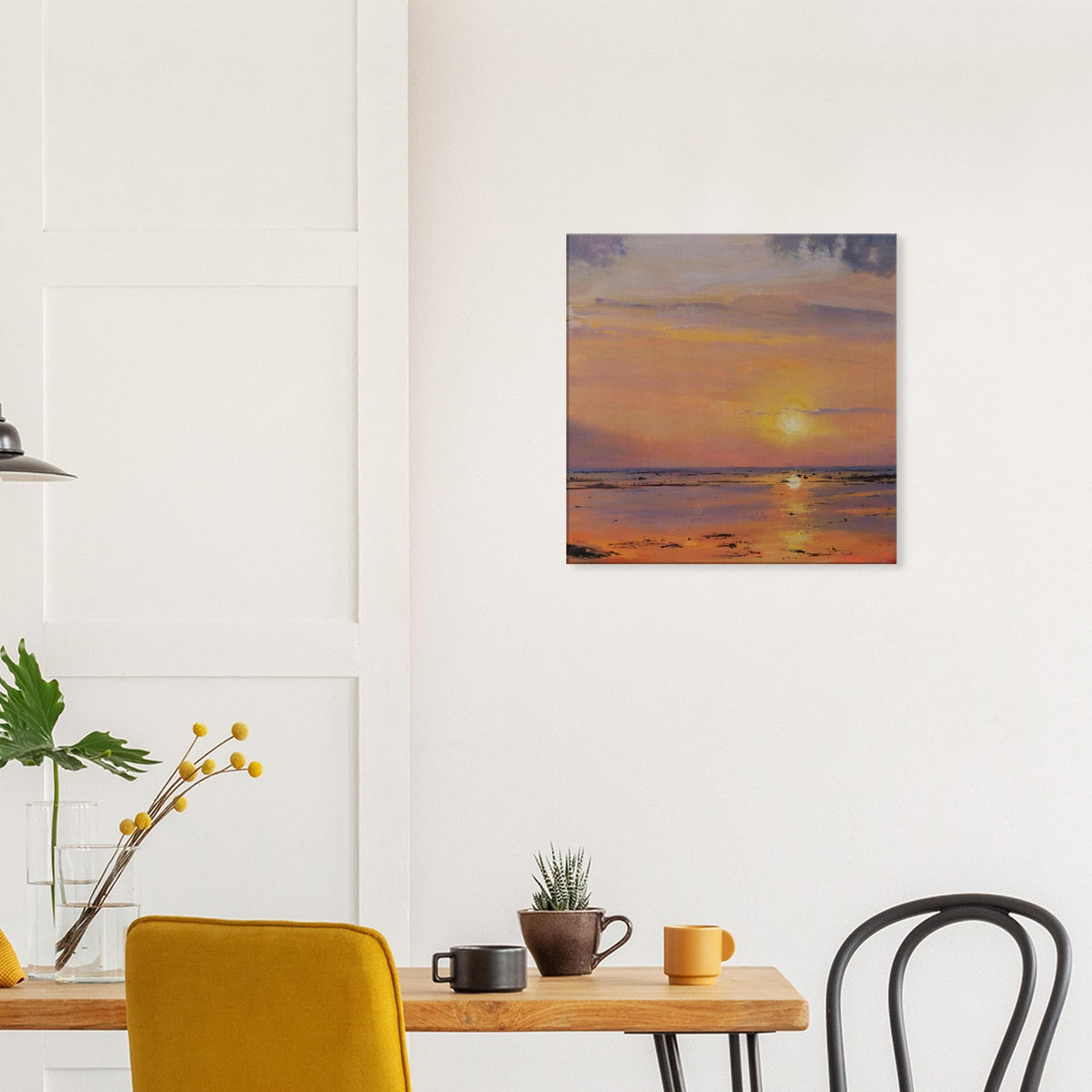 Bali Sunset canvas print by Rocío Arrupe hanging above a dining table